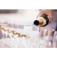 Schaumwein-Tasting Salzburg – Champagnergläser beim Empfang